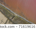 High angle drone view of pink lake where salt is extracted, Sasyk Sivash lake in Crimea High angle drone view of pink lake where salt is extracted, Sasyk Sivash lake in Crimea 71619616