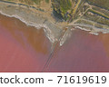 High angle drone view of pink lake where salt is extracted, Sasyk Sivash lake in Crimea High angle drone view of pink lake where salt is extracted, Sasyk Sivash lake in Crimea 71619619