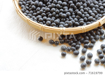 Black beans in New Year's preparation colander 71619799