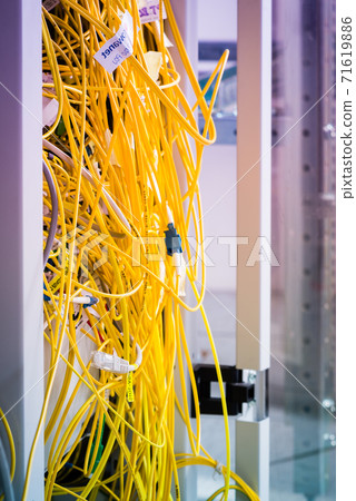 server with connected fiber optics cables 71619886