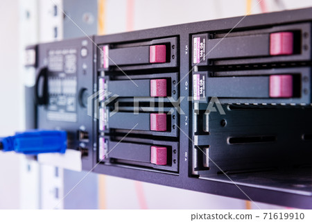 Array of data storage hard drives in internet data center 71619910