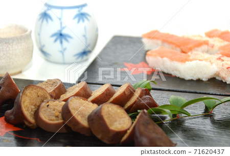 Squid rice on Japanese tableware with crab and salmon pressed 71620437