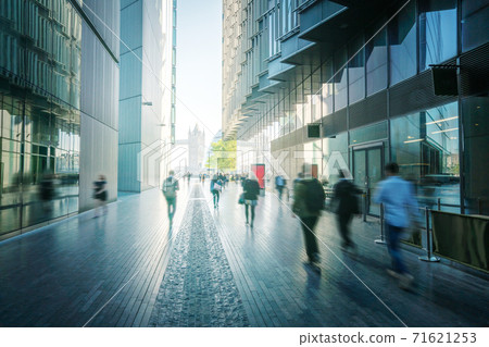 business people, modern buildings and Tower Bridge, London, UK business people, modern buildings and Tower Bridge, London, UK 71621253