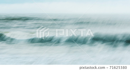 Intentional camera movement of ocean wave Intentional camera movement of ocean wave 71625380