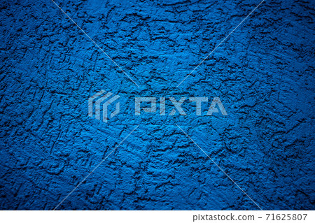 The wall is made of plaster. Rough surface. Solid color abstract background. The wall is made of plaster. Rough surface. Solid color abstract background. 71625807