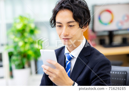 Businessman office smartphone Businessman office smartphone 71629285