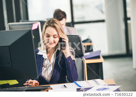 Businesswoman marketing sale office working busy to customer contact. Businesswoman marketing sale office working busy to customer contact. 71630122