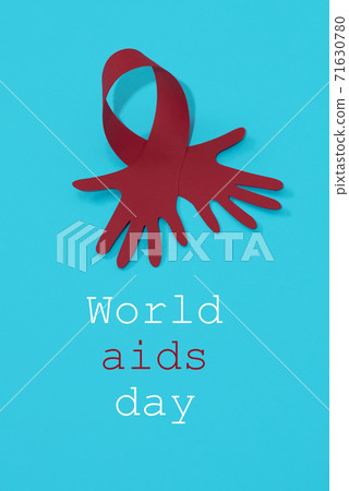 red ribbon and text world aids day 71630780