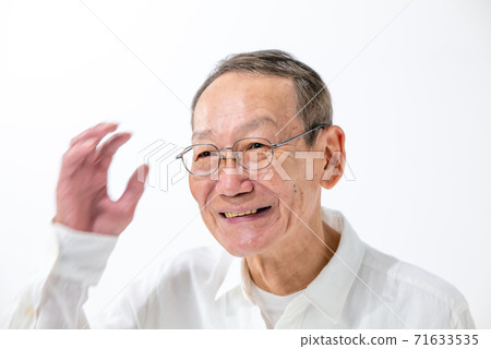 A shy senior man portrait 71633535