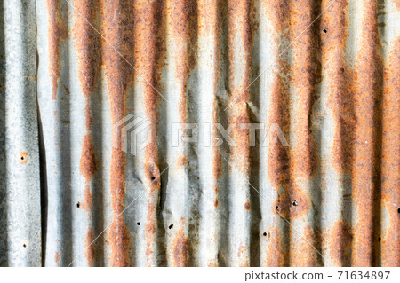 Grunge silver and red rust corrugated iron metal plate textured background Grunge silver and red rust corrugated iron metal plate textured background 71634897