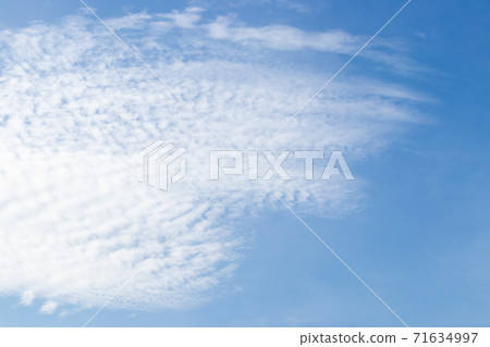 Clear blue color sky with white cloud background Clear blue color sky with white cloud background 71634997
