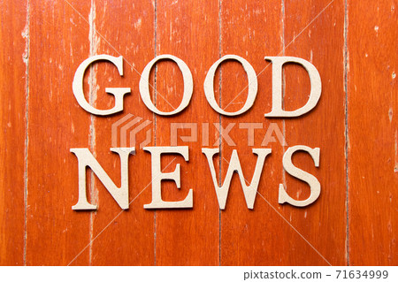 Alphabet letter in word good news on old red color wood plate background Alphabet letter in word good news on old red color wood plate background 71634999