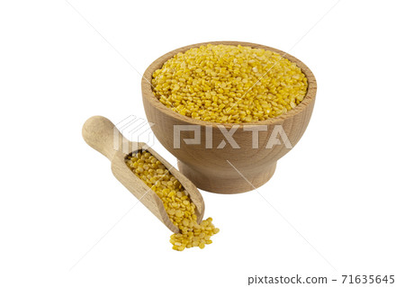 Mung dal or Mung daal bean in wooden bowl scoop Mung dal or Mung daal bean in wooden bowl scoop 71635645