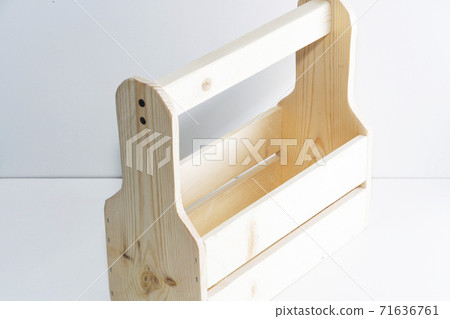 Empty wooden box. Made of pine, on a light white background. 71636761
