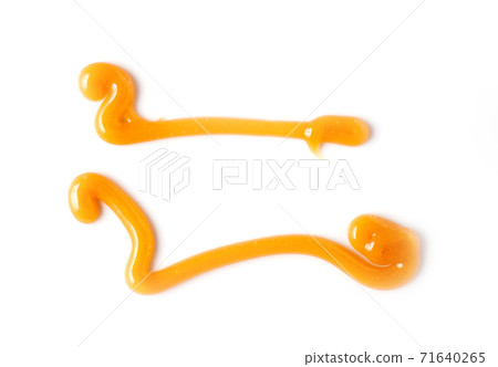 sweet caramel sauce isolated on white background, top view sweet caramel sauce isolated on white background, top view 71640265