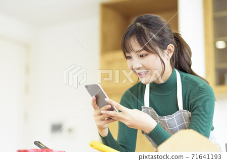 Valentine's Day Women Taking Homemade Chocolate 71641193