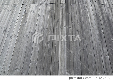 Old wooden roof that is faded in gray Old wooden roof that is faded in gray 71642409