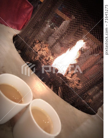 Winter wood stove and latte mug Winter wood stove and latte mug 71645275