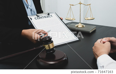 Lawyer or counselor works in the courtroom and negotiates with clients or complainants seeking justice on land encroachment, Law that validity and justice concept. 71647163
