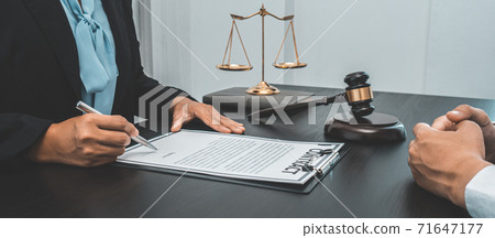 Lawyer or counselor works in the courtroom and negotiates with clients or complainants seeking justice on land encroachment, Law that validity and justice concept. 71647177