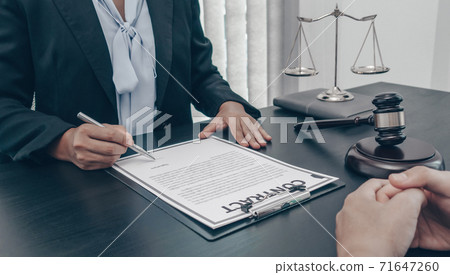 Lawyer or counselor works in the courtroom and negotiates with clients or complainants seeking justice on land encroachment, Law that validity and justice concept. 71647260