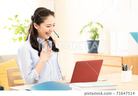 Woman making a video call 71647514