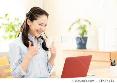 Woman making a video call 71647515