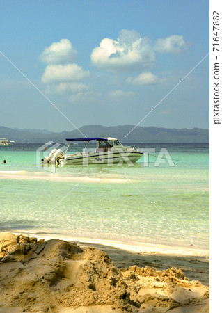 White sand and blue sea on Boracay Island, Philippines White sand and blue sea on Boracay Island, Philippines 71647882
