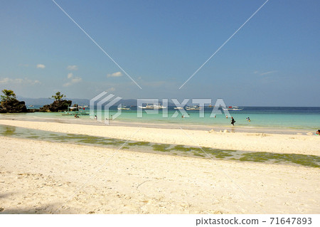 White sand and blue sea on Boracay Island, Philippines 71647893