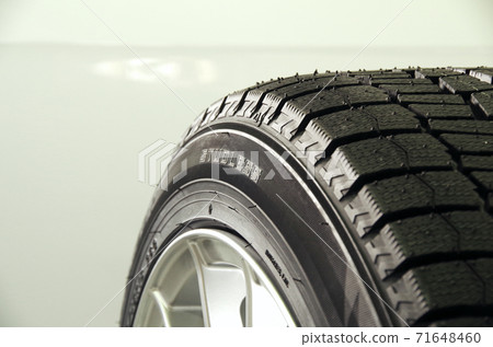 New studless tire assembled on a new aluminum wheel New studless tire assembled on a new aluminum wheel 71648460