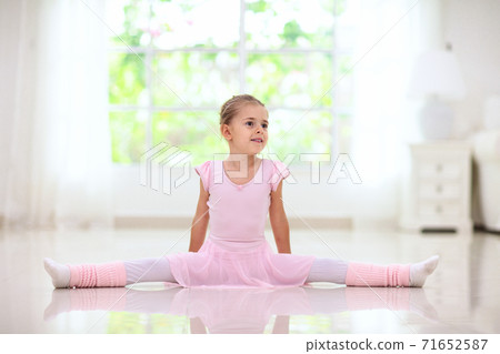 Baby ballet. Little ballerina girl in dance class. 71652587
