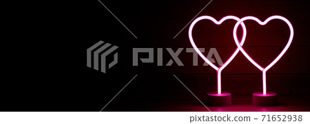 Two glowing pink neon hearts 71652938