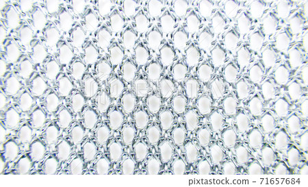 Macro shot of gray mesh fabric 71657684
