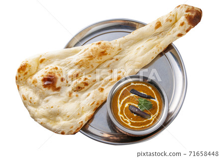 Curry and naan 71658448