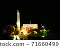 Pink Christmas decorations with candlels on a black background 71660499