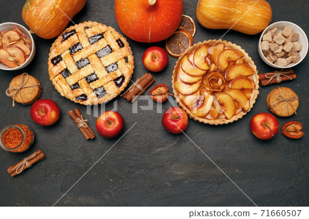 Berry tart pie and apple tart pie on black background 71660507