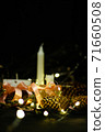 Pink Christmas decorations with candlels on a black background 71660508