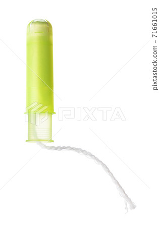 Unpacked female medical tampon isolated on white background Unpacked female medical tampon isolated on white background 71661015
