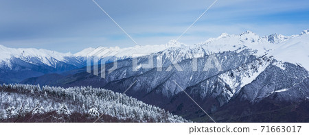 Panoramic view on high snowy mountains in winter at sunny day. Caucasus Mountains, Mount Ushba. Svaneti region of Georgia Panoramic view on high snowy mountains in winter at sunny day. Caucasus Mountains, Mount Ushba. Svaneti region of Georgia 71663017