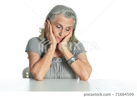 Portrait of sad senior woman posing isolated Portrait of sad senior woman posing isolated 71664509