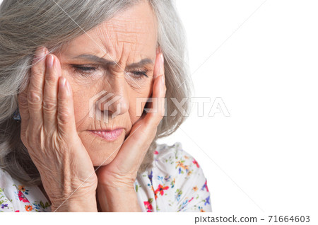 Close up portrait of sad senior woman Close up portrait of sad senior woman 71664603