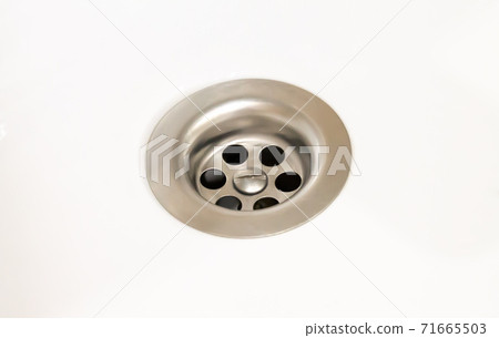 Sink drain or bathroom water drain isolated on white Sink drain or bathroom water drain isolated on white 71665503
