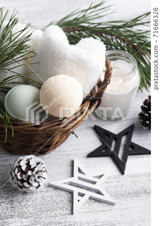 Bath bombs in basket in Christmas SPA composition Bath bombs in basket in Christmas SPA composition 71666326
