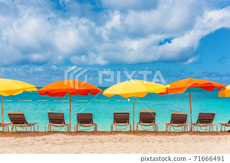 Beach chairs and umbrellas vacation background Beach chairs and umbrellas vacation background 71666491