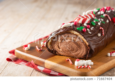 Chocolate yule log christmas cake Chocolate yule log christmas cake 71667404