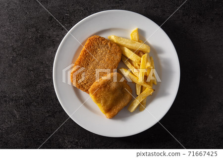 San Jacobo steak filled with cheese and ham San Jacobo steak filled with cheese and ham 71667425