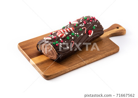 Chocolate yule log christmas cake isolated on white background 71667562