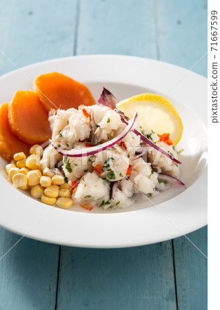 Traditional peruvian ceviche with fish, sweet potato, corn and vegetables Traditional peruvian ceviche with fish, sweet potato, corn and vegetables 71667599