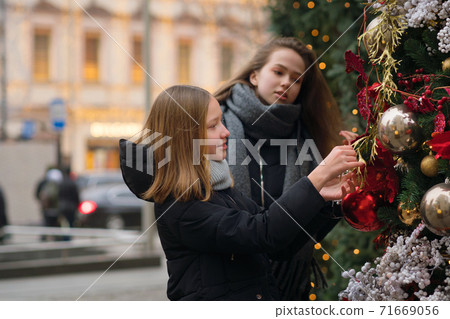 Sisters together Christmas market Sisters together Christmas market 71669056