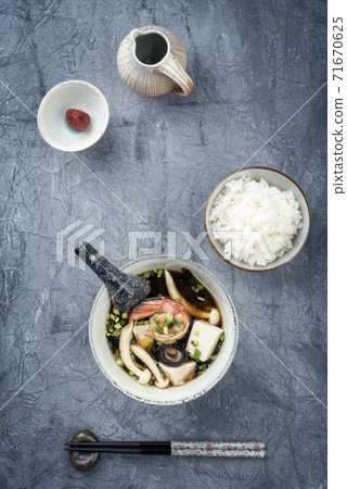 Traditional Japanese miso soup with king prawns and rice Traditional Japanese miso soup with king prawns and rice 71670625